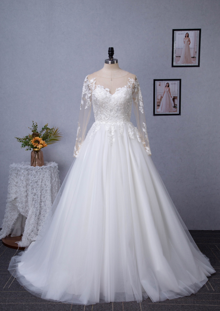 
                      
                        Illusion Long Sleeve Chapel Train Lace Wedding Dress
                      
                    