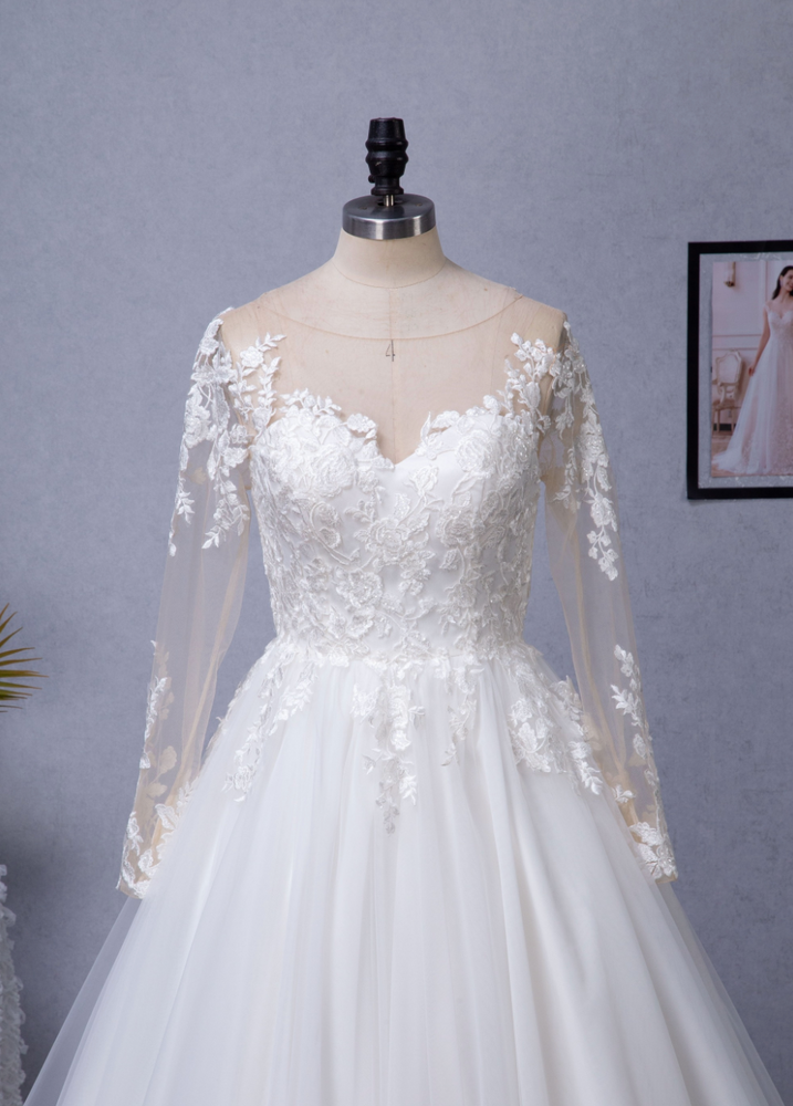 
                      
                        Illusion Long Sleeve Chapel Train Lace Wedding Dress
                      
                    