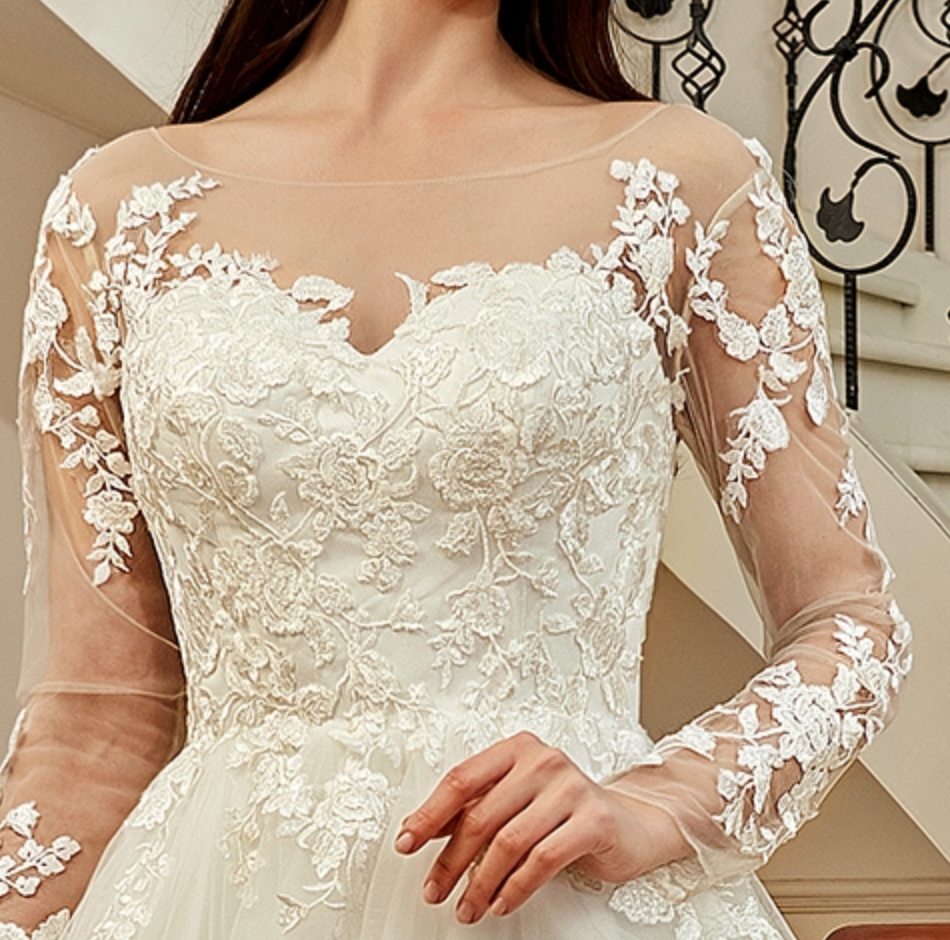 Load image into Gallery viewer, Illusion Long Sleeve Chapel Train Lace Wedding Dress
