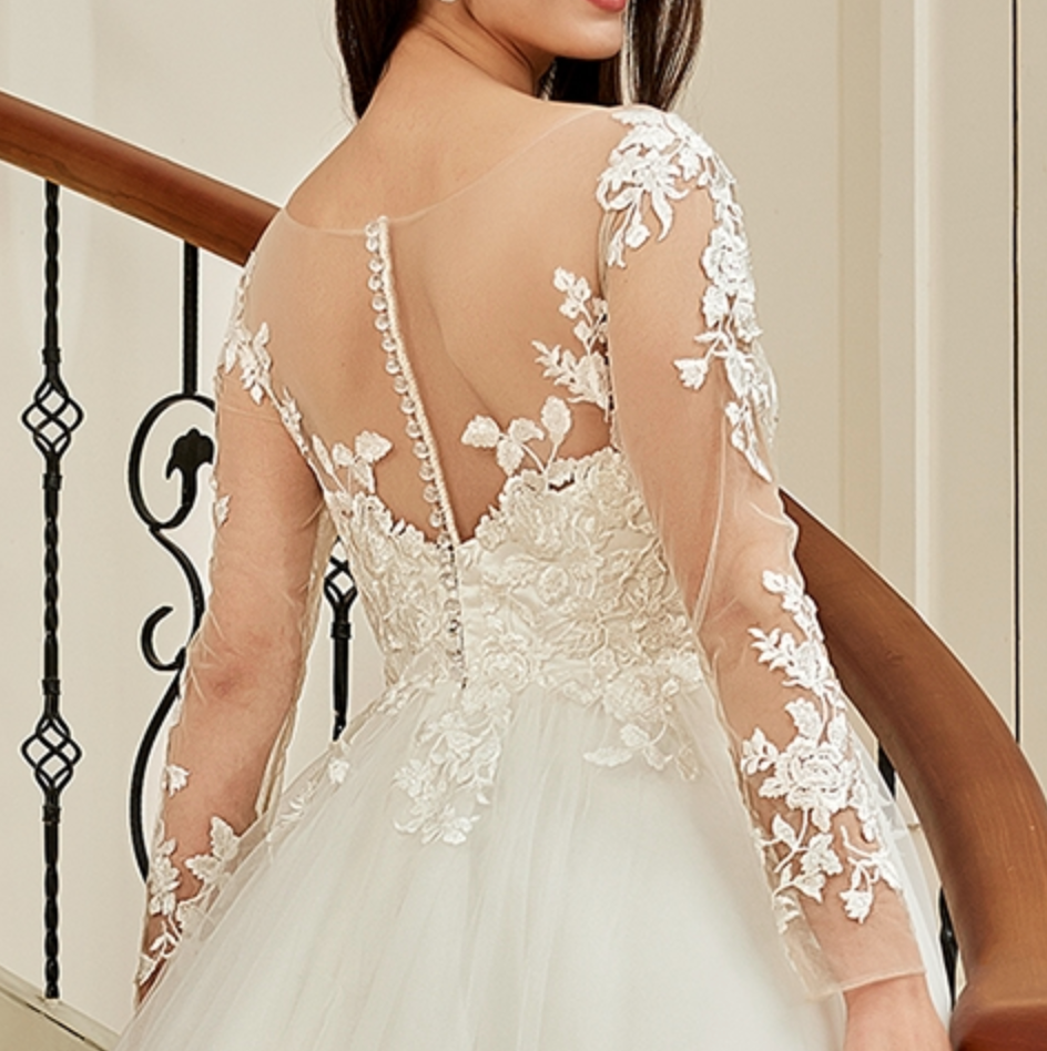 
                      
                        Illusion Long Sleeve Chapel Train Lace Wedding Dress
                      
                    