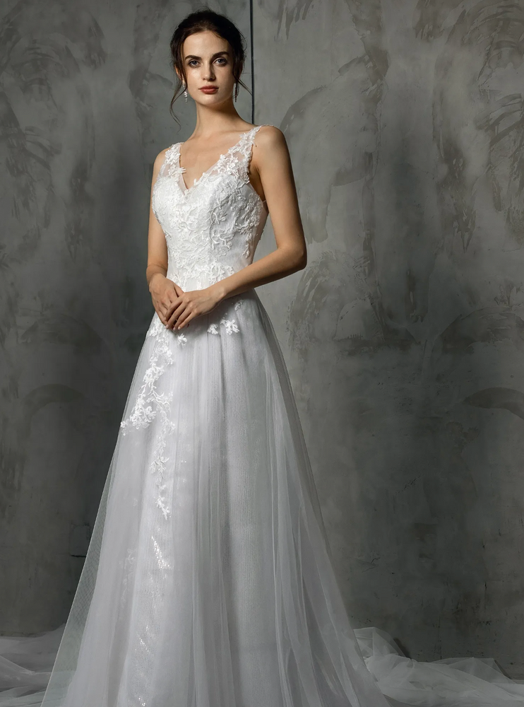 
                      
                        Shining V-Neck Wedding Dress With Long Tulle Train
                      
                    