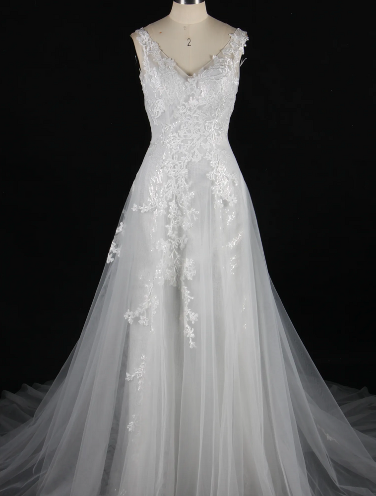 
                      
                        Shining V-Neck Wedding Dress With Long Tulle Train
                      
                    