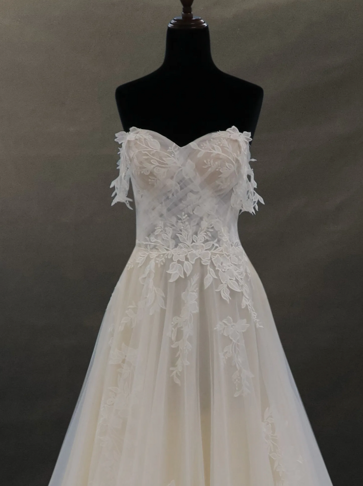
                      
                        Off-The-Shoulder Lace And Tulle Bridal Gown With Sheer Bodice
                      
                    