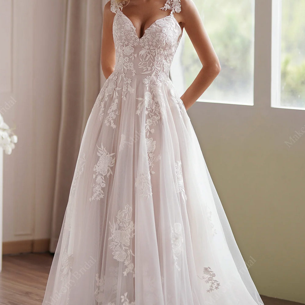 
                      
                        Delicate Shimmering Lace Wedding Gown With Sweetheart Bodice
                      
                    