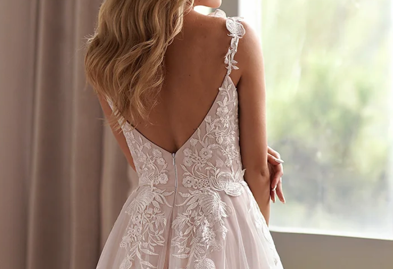 
                      
                        Delicate Shimmering Lace Wedding Gown With Sweetheart Bodice
                      
                    