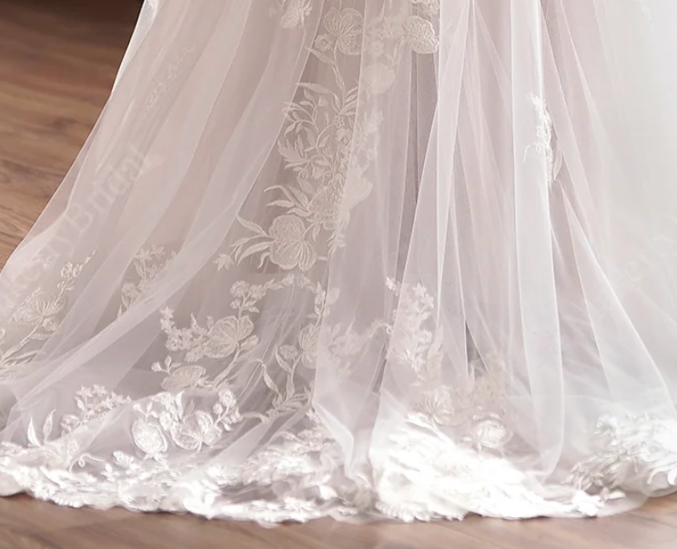 
                      
                        Delicate Shimmering Lace Wedding Gown With Sweetheart Bodice
                      
                    