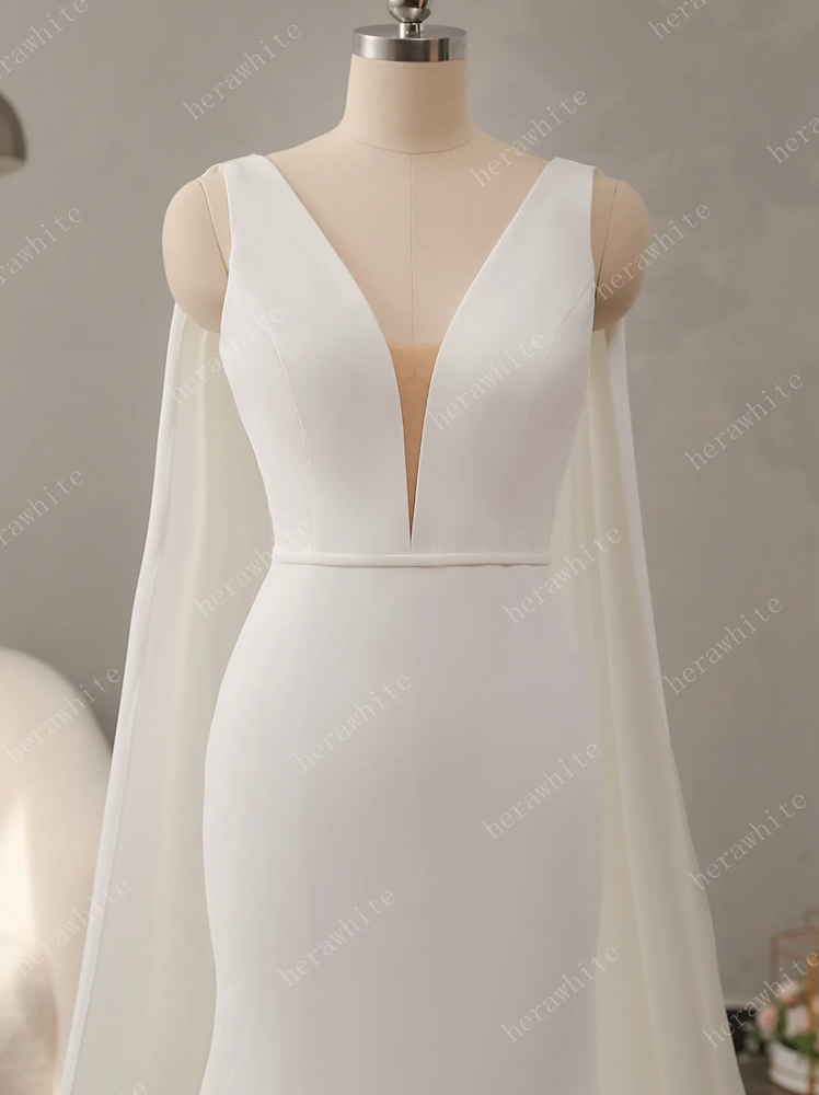 
                      
                        Deep V-Neckline Crepe Wedding Dress with Detachable Cape
                      
                    