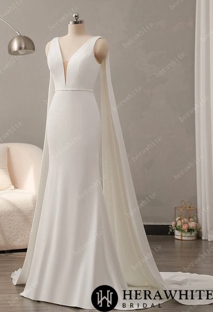 
                      
                        Deep V-Neckline Crepe Wedding Dress with Detachable Cape
                      
                    