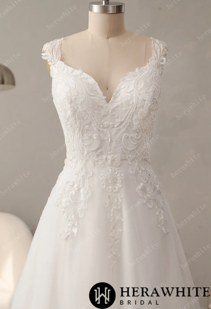 
                      
                        Timeless Lace Wedding Dress with V-Neckline
                      
                    