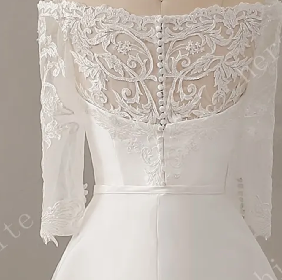 
                      
                        Off The Shoulder Neckline Wedding Dress with Lace Back
                      
                    