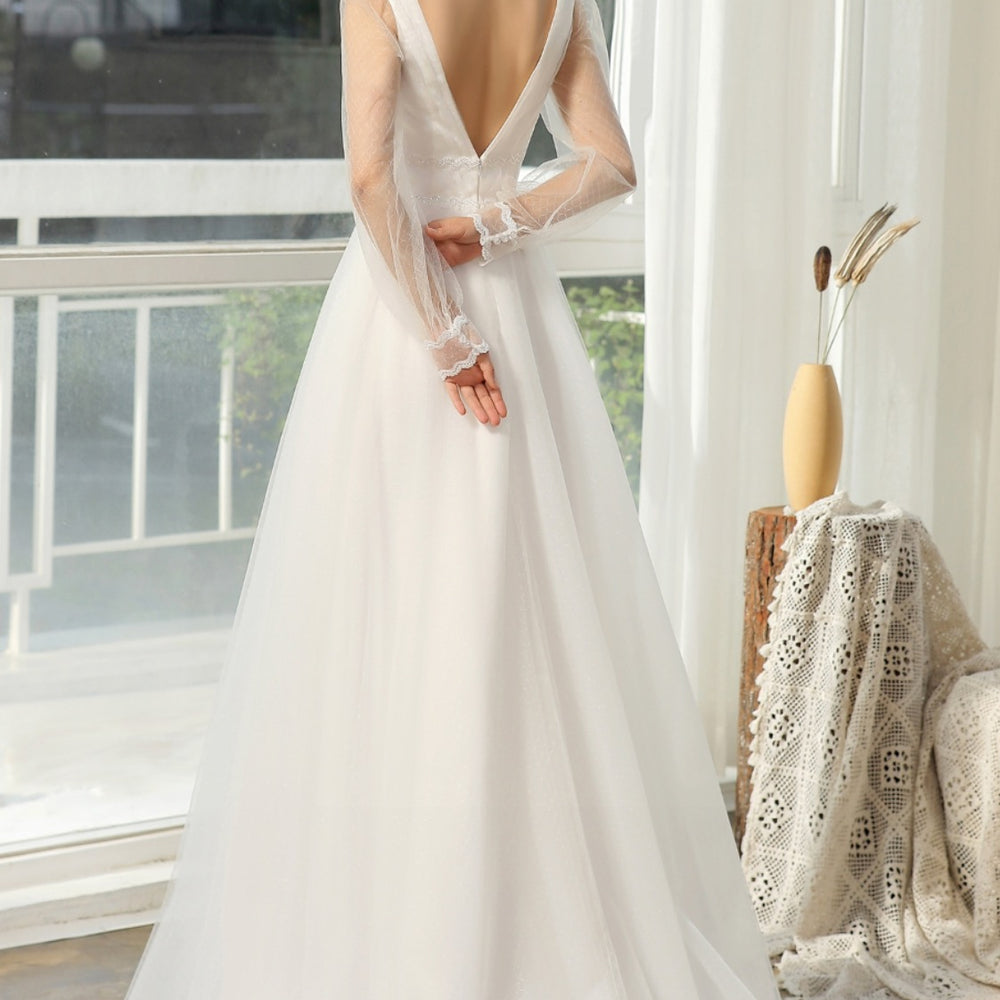 
                      
                        Bishop Long Sleeve Ruched Illusion V-Neckline Bridal Gown
                      
                    