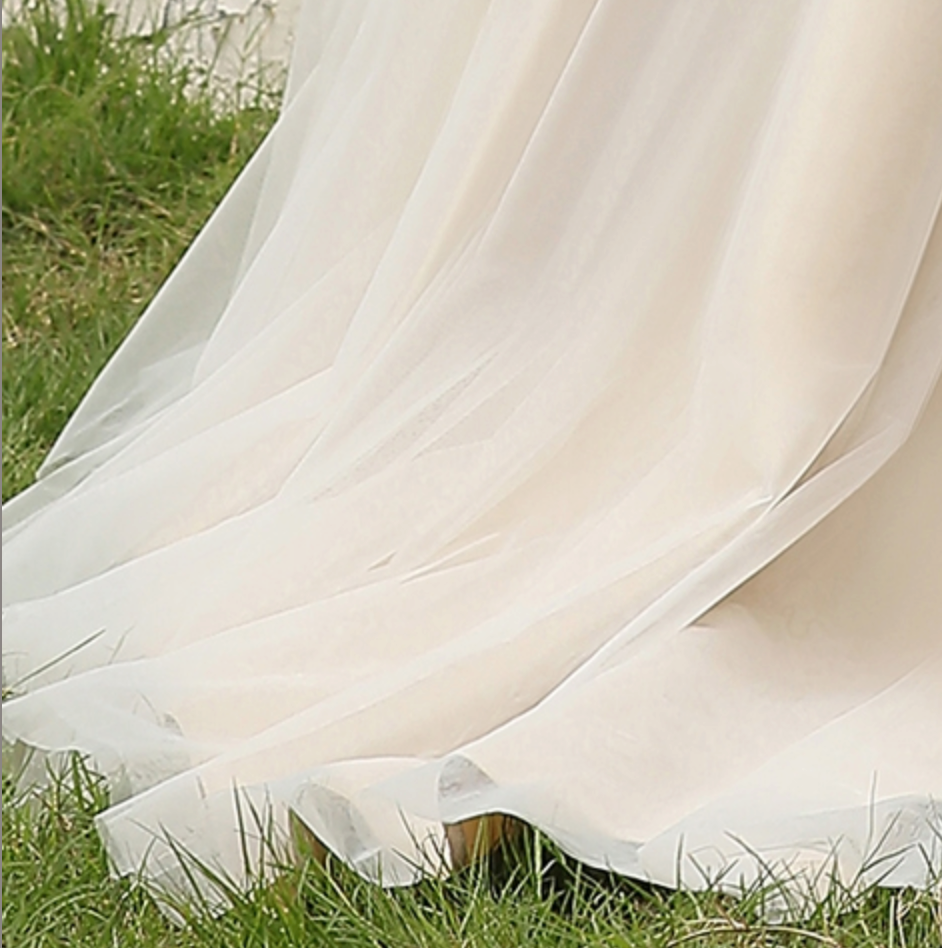 
                      
                        Illusion Halter Neckline Ball Gown Wedding Dress
                      
                    
