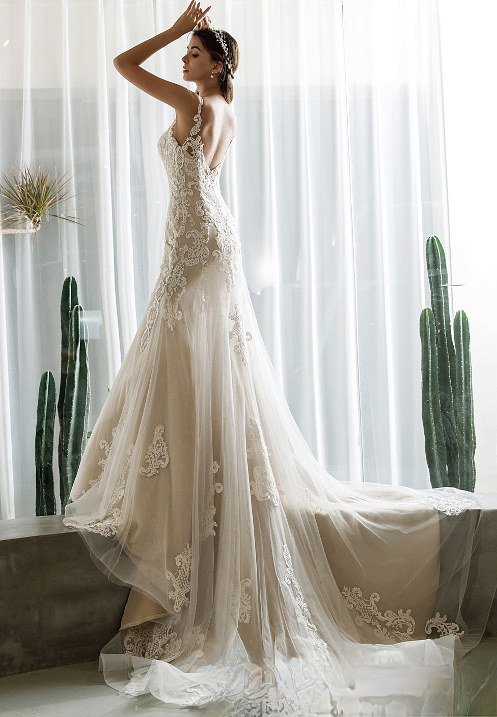 Alluring Long Sleeve Lace Fit-and-Flare Wedding Dress with Open Back Detail