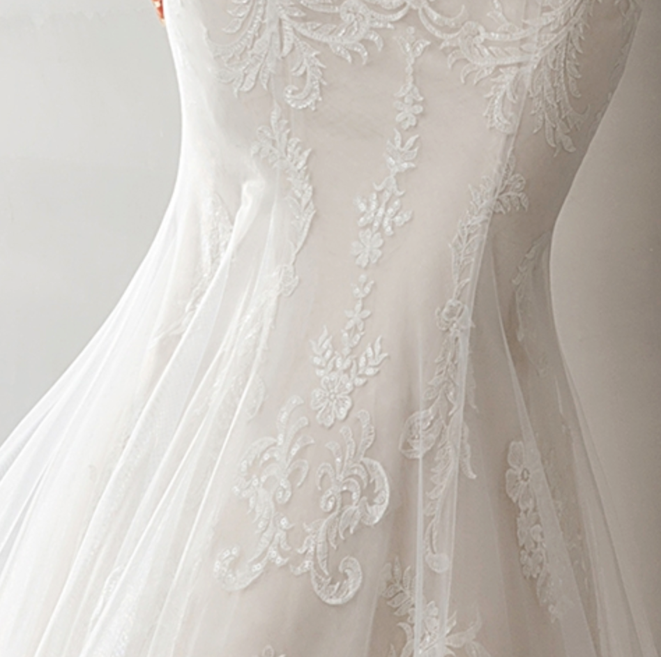 
                      
                        Geometric Lace Fit and Flare Bridal Gown With Sheer Train
                      
                    