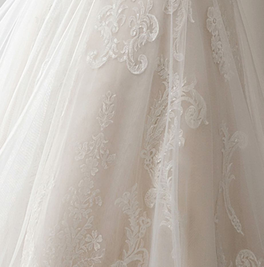 
                      
                        Geometric Lace Fit and Flare Bridal Gown With Sheer Train
                      
                    