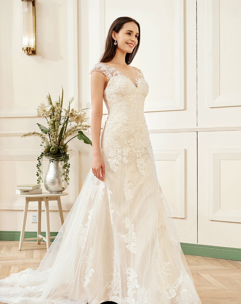 
                      
                        Stunning Illusion Lace Bateau Neckline With Cap Sleeve Wedding Gown
                      
                    
