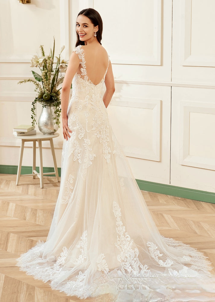 
                      
                        Stunning Illusion Lace Bateau Neckline With Cap Sleeve Wedding Gown
                      
                    