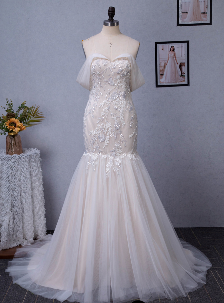 
                      
                        Off-The-Shoulder Mermaid Chapel Train Sequined Tulle Wedding Dress
                      
                    