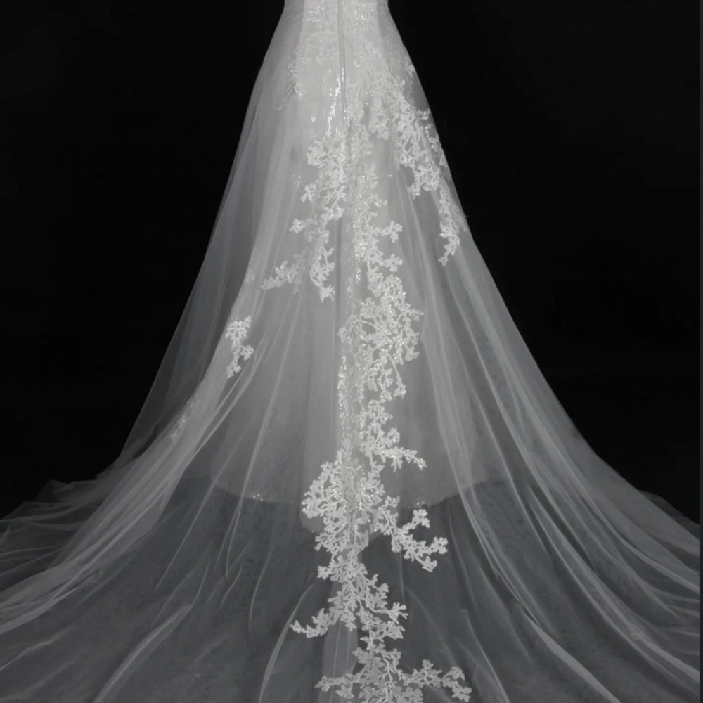 
                      
                        Shining V-Neck Wedding Dress With Long Tulle Train
                      
                    