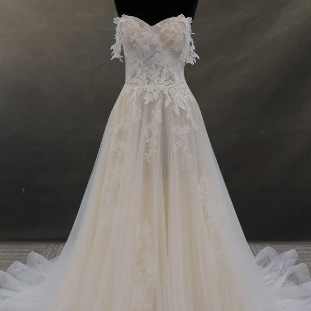 
                      
                        Off-The-Shoulder Lace And Tulle Bridal Gown With Sheer Bodice
                      
                    