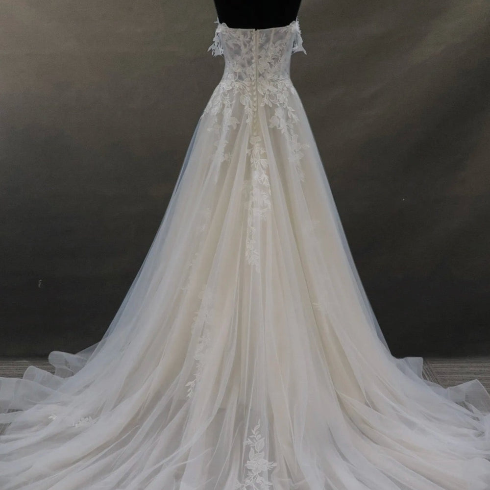 
                      
                        Off-The-Shoulder Lace And Tulle Bridal Gown With Sheer Bodice
                      
                    