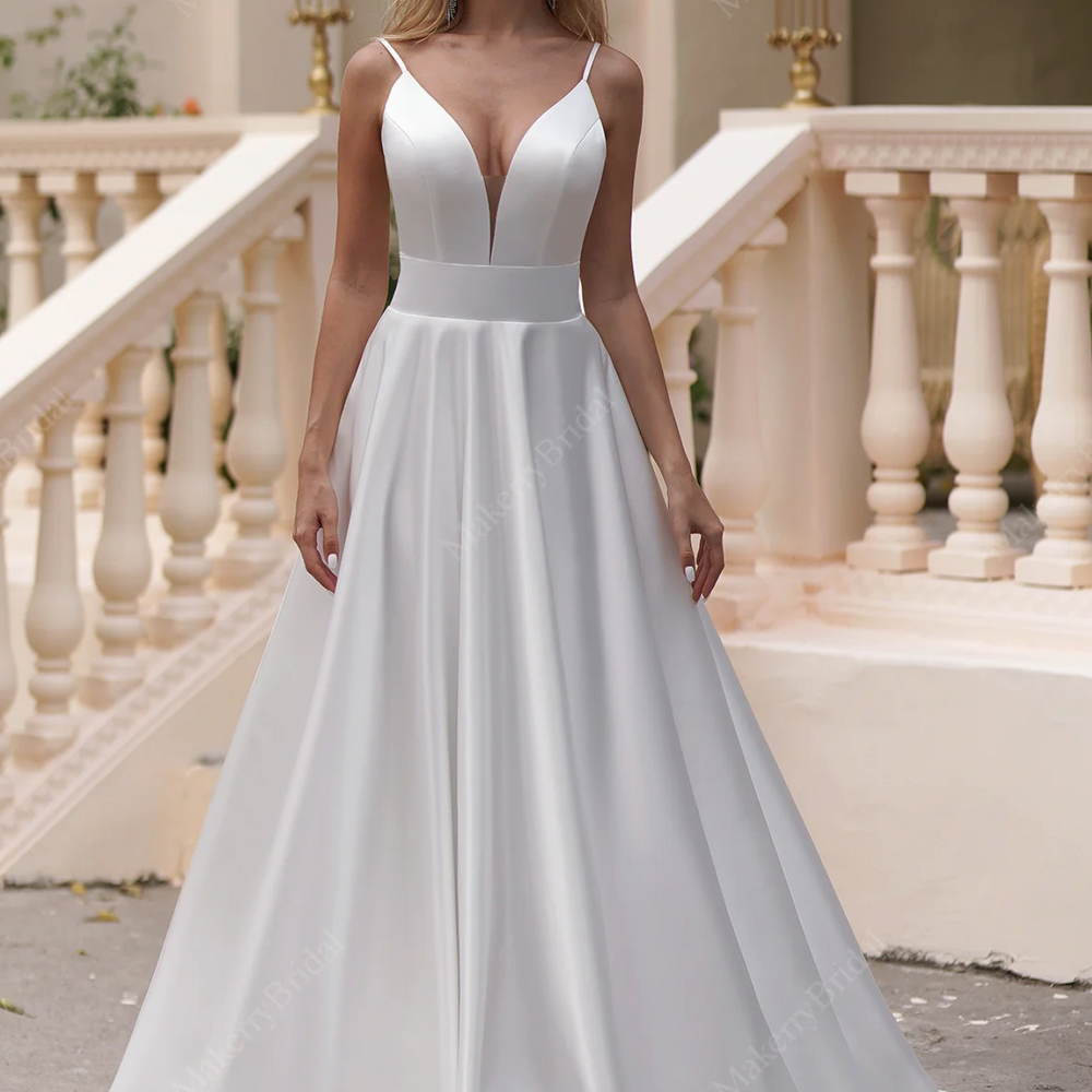
                      
                        A Satin Timeless Ball Gown With Pockets
                      
                    