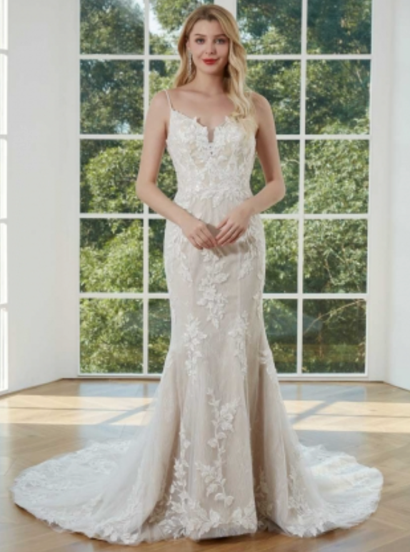 
                      
                        Vestido de novia sirena con encaje y tul floral
                      
                    