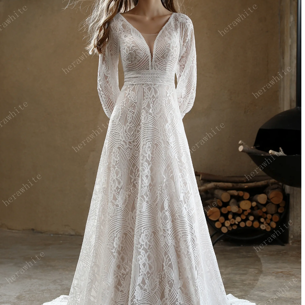 
                      
                        Unique Plunging V-Neck Lace Bohemian Wedding Gown
                      
                    