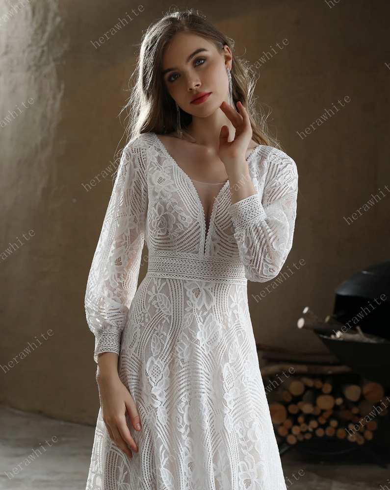 
                      
                        Unique Plunging V-Neck Lace Bohemian Wedding Gown
                      
                    