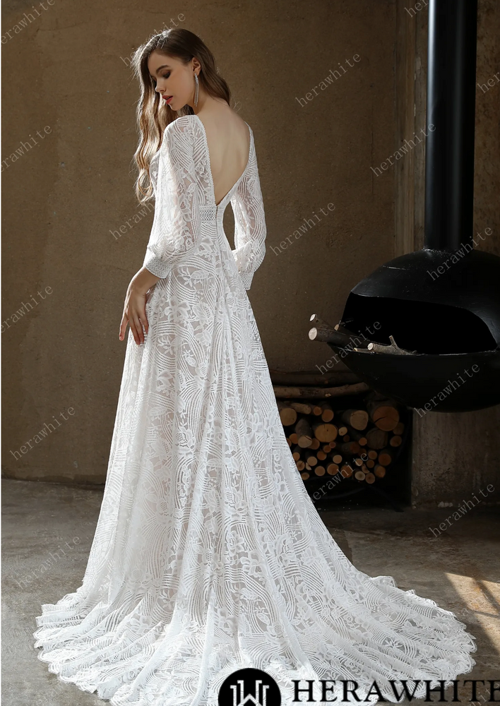 
                      
                        Unique Plunging V-Neck Lace Bohemian Wedding Gown
                      
                    