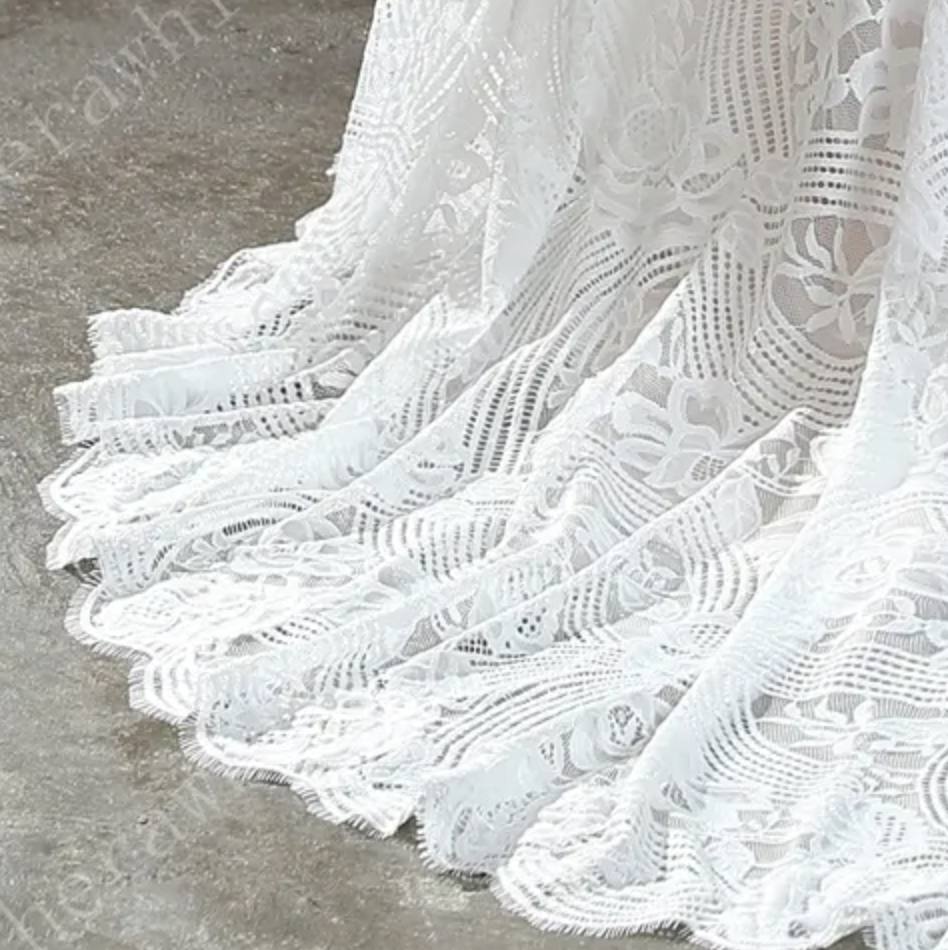 
                      
                        Unique Plunging V-Neck Lace Bohemian Wedding Gown
                      
                    