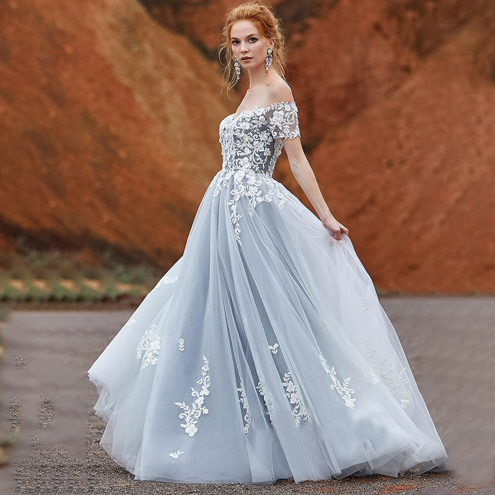 
                      
                        Lace Tulle Off Shoulder A Line Wedding Bridal Gown
                      
                    