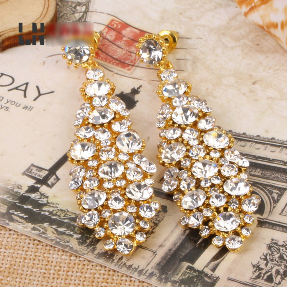 
                      
                        Crystal Long Drop Wedding Jewelry in Silver or Gold - TulleLux Bridal Crowns &  Accessories 
                      
                    