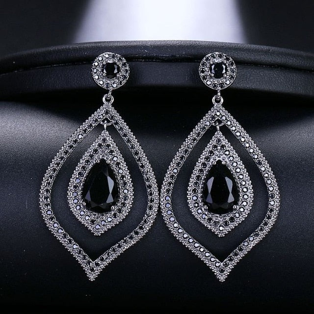 
                      
                        Shiny Leaf Shaped Cubic Zirconia Crystal Long Dangle Drop Pageant Earrings - TulleLux Bridal Crowns &  Accessories 
                      
                    