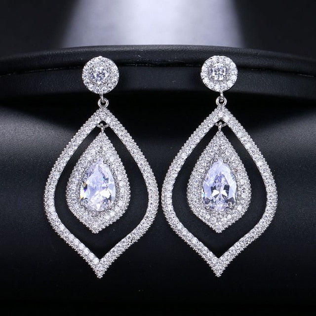 
                      
                        Shiny Leaf Shaped Cubic Zirconia Crystal Long Dangle Drop Pageant Earrings - TulleLux Bridal Crowns &  Accessories 
                      
                    