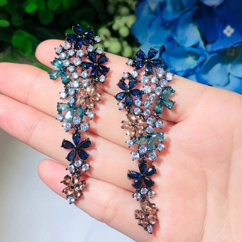 
                      
                        Long Drop Flower Multi Color Blue Cubic Zirconia Fashion Statement Earrings - TulleLux Bridal Crowns &  Accessories 
                      
                    