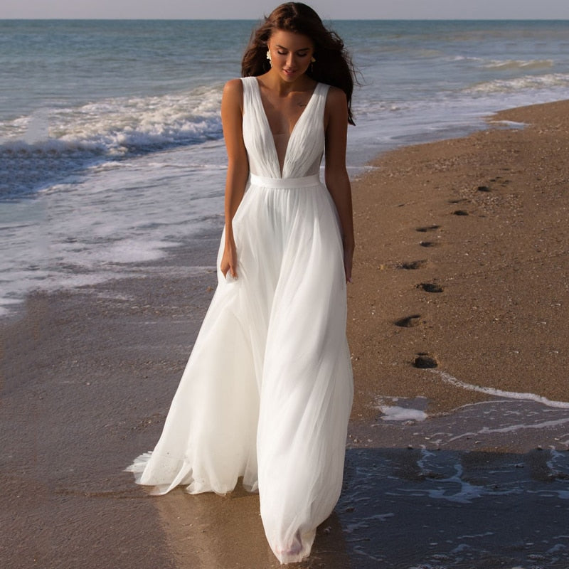 
                      
                        Deep V Sleeveless Bridal Boho Tulle Wedding Gown
                      
                    