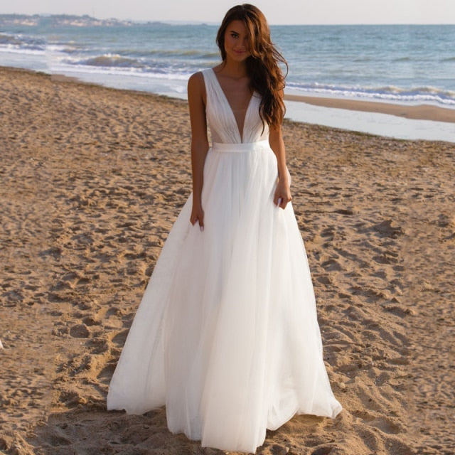 
                      
                        Deep V Sleeveless Bridal Boho Tulle Wedding Gown
                      
                    