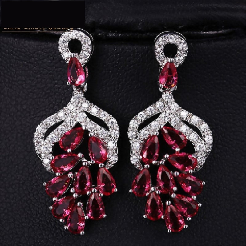 
                      
                        Micro Pave AAA+ Cubic Zircon Drop Flower Shaped Earrings
                      
                    