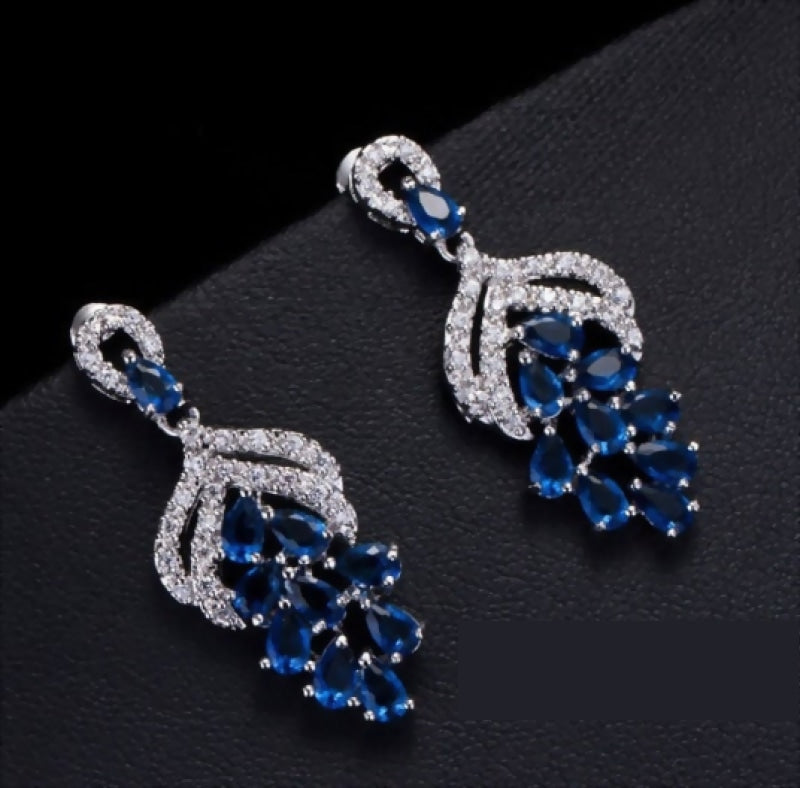 
                      
                        Micro Pave AAA+ Cubic Zircon Drop Flower Shaped Earrings
                      
                    