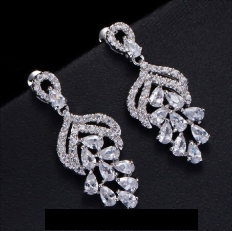 
                      
                        Micro Pave AAA+ Cubic Zircon Drop Flower Shaped Earrings
                      
                    